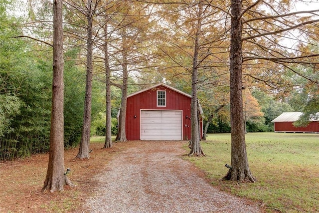 248 Chateau Dr, Slidell, LA 70460 - garage featuring a lawn