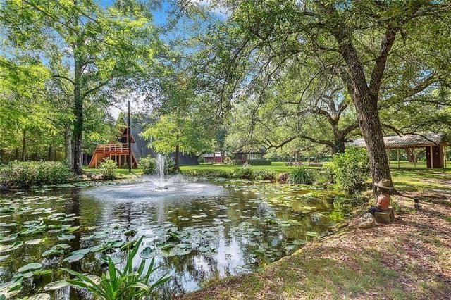 248 Chateau Dr, Slidell, LA 70460 - view of home's community with a water view