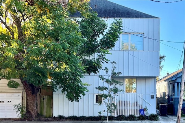 view of property exterior with a garage