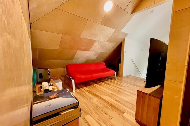 bonus room with hardwood / wood-style flooring