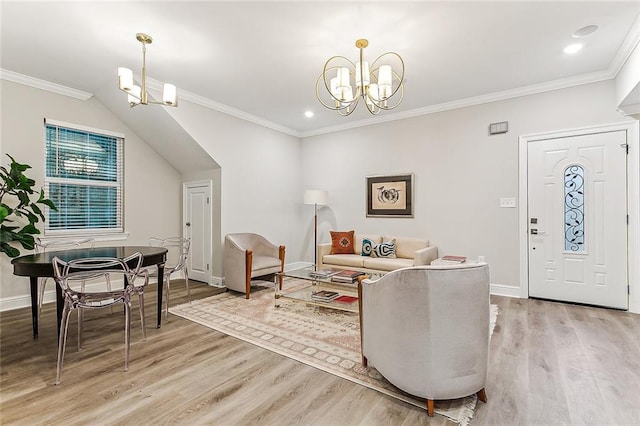 1908-10 St Louis St, New Orleans, LA 70112 - living room featuring a chandelier, light wood-type flooring, ornamental molding, and recessed lighting