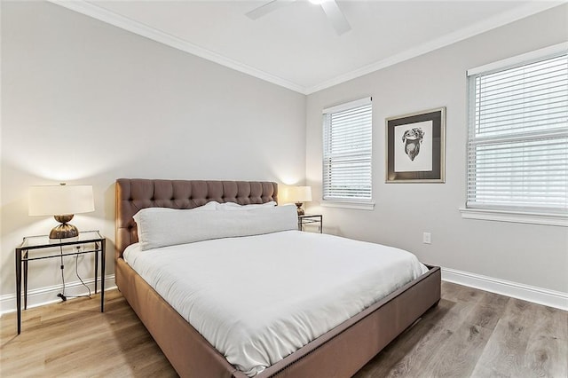 1908-10 St Louis St, New Orleans, LA 70112 - bedroom with ornamental molding, wood finished floors, and ceiling fan