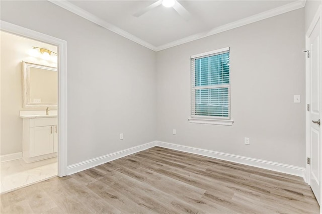 1908-10 St Louis St, New Orleans, LA 70112 - unfurnished room with a ceiling fan, light wood-style floors, and ornamental molding