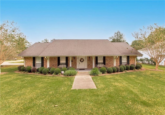 single story home with a front yard