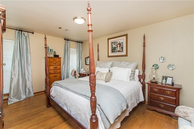 bedroom featuring light wood-type flooring