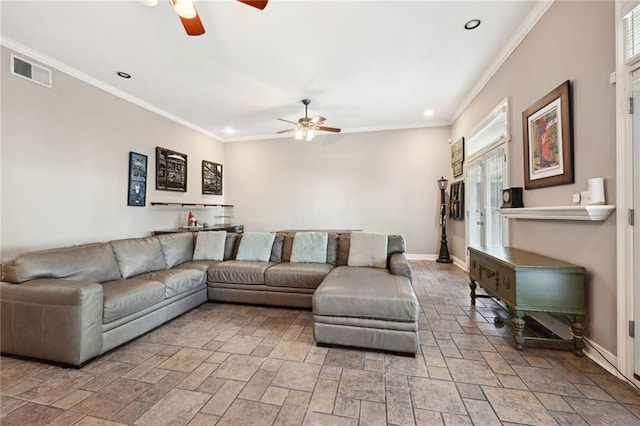 living room featuring ceiling fan and crown molding