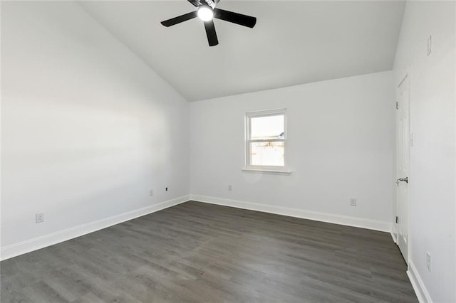 empty room featuring ceiling fan, dark hardwood / wood-style flooring, and high vaulted ceiling