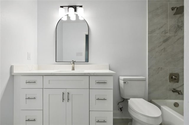 full bathroom with vanity, toilet, and tiled shower / bath combo