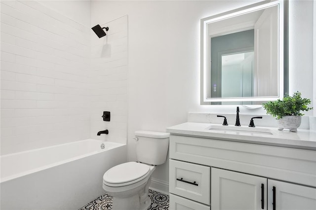 full bathroom featuring vanity, tiled shower / bath combo, toilet, and tile patterned flooring