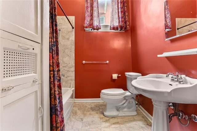 full bath with marble finish floor, baseboards, shower / tub combo with curtain, and toilet