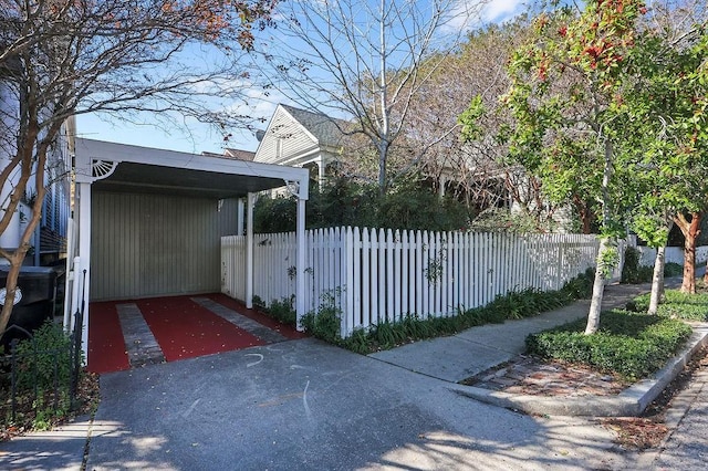 view of gate featuring a fenced front yard