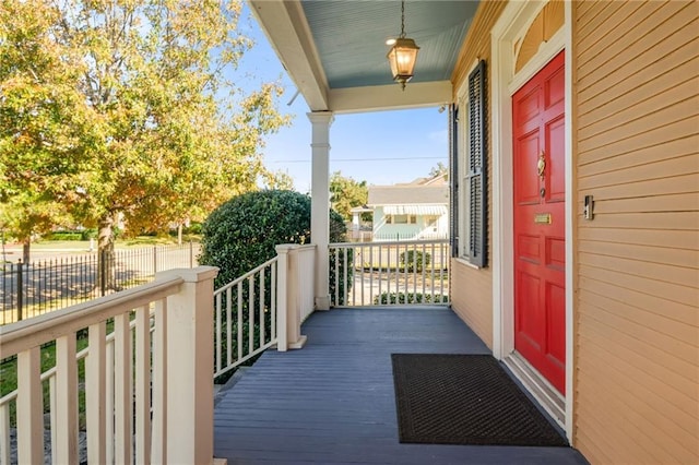 wooden deck featuring covered porch