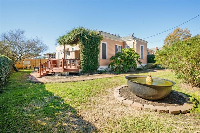 view of yard featuring a wooden deck