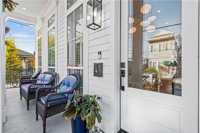 entrance to property featuring a porch