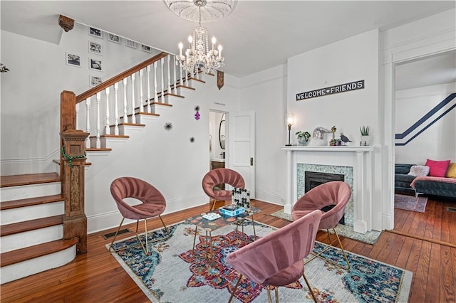 dining room featuring hardwood / wood-style flooring and an inviting chandelier