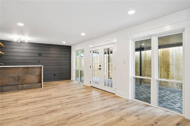 2914 Ridgeway Dr, Metairie, LA 70002 - unfurnished living room with french doors, wood finished floors, and recessed lighting