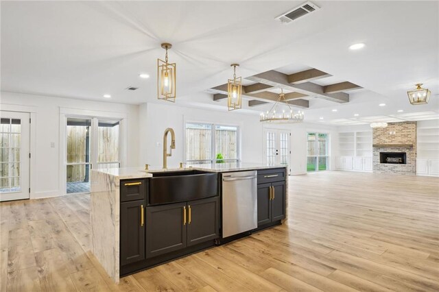 2914 Ridgeway Dr, Metairie, LA 70002 - kitchen featuring dishwasher, open floor plan, light wood-type flooring, hanging light fixtures, and recessed lighting