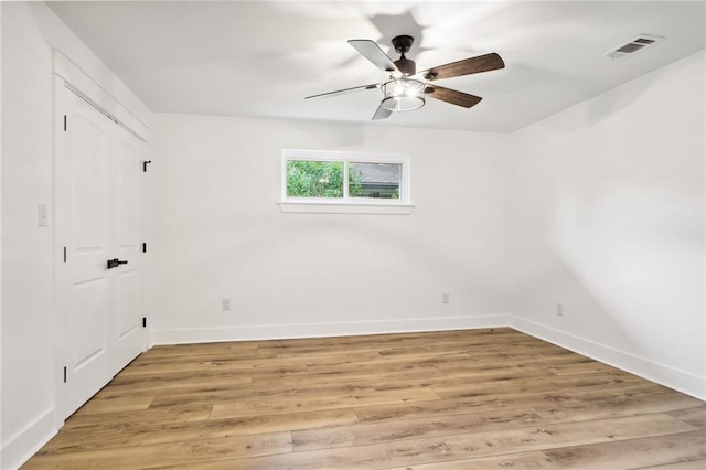 2914 Ridgeway Dr, Metairie, LA 70002 - unfurnished bedroom featuring light wood-type flooring, a ceiling fan, and a closet