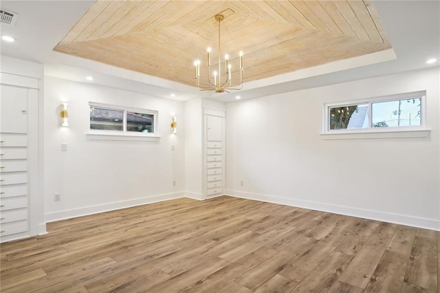 2914 Ridgeway Dr, Metairie, LA 70002 - unfurnished room with a raised ceiling, a chandelier, light wood finished floors, recessed lighting, and wood ceiling
