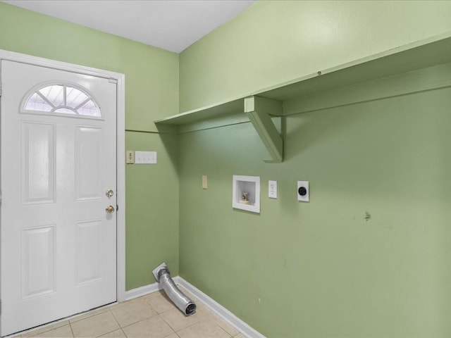 laundry area featuring hookup for a washing machine, electric dryer hookup, and light tile patterned flooring