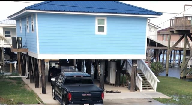 exterior space with a carport