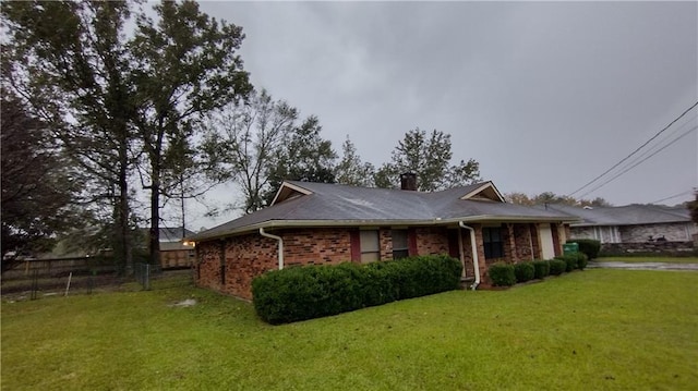 view of front of home with a front yard