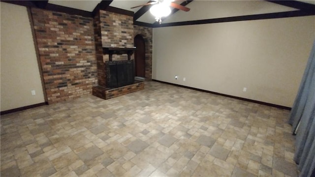 unfurnished living room featuring a fireplace and ceiling fan