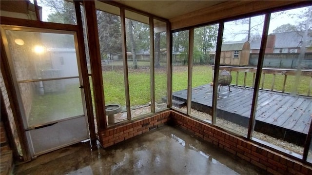 unfurnished sunroom featuring a healthy amount of sunlight