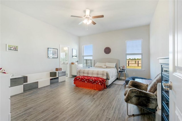 bedroom featuring hardwood / wood-style flooring and ceiling fan