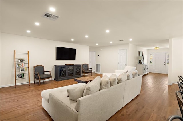 living room with hardwood / wood-style flooring