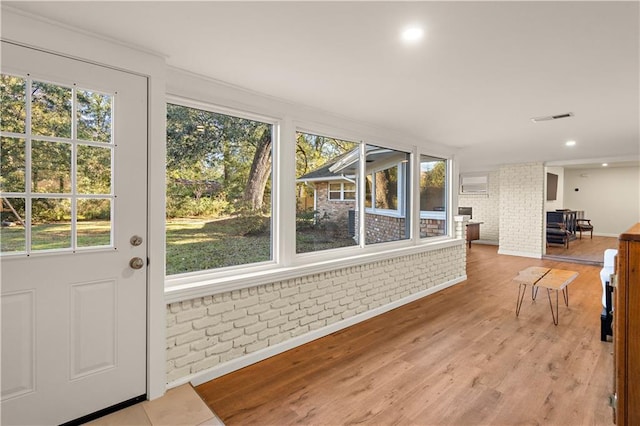 sunroom with plenty of natural light