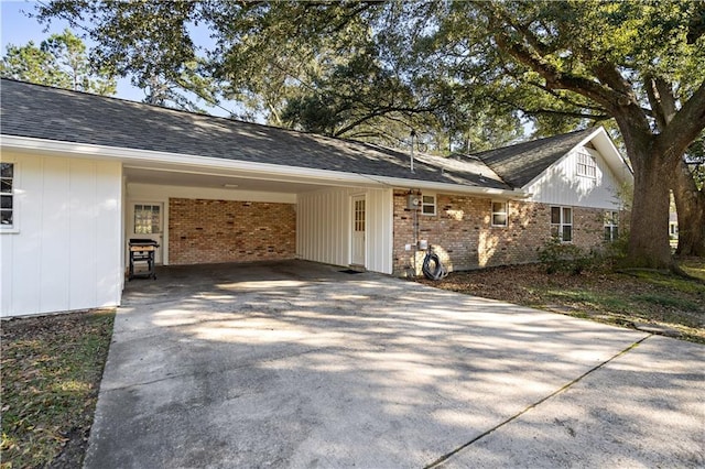 view of property exterior with a carport