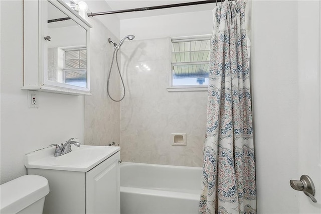 full bathroom featuring vanity, shower / bathtub combination with curtain, and toilet