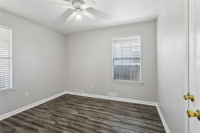 unfurnished room with dark hardwood / wood-style floors and ceiling fan