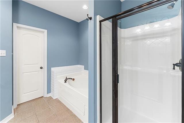 bathroom with plus walk in shower and tile patterned floors