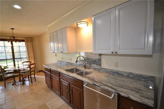 kitchen featuring dishwasher, dark brown cabinetry, white cabinets, and sink