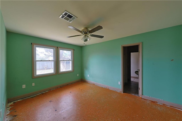 unfurnished room with ceiling fan