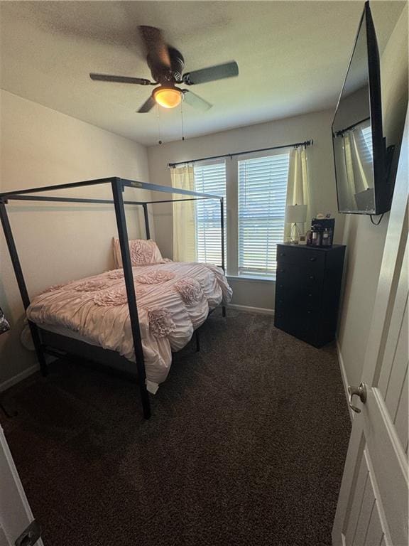 bedroom featuring carpet flooring, ceiling fan, and baseboards