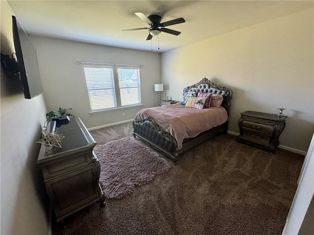 bedroom with a ceiling fan, baseboards, and carpet floors