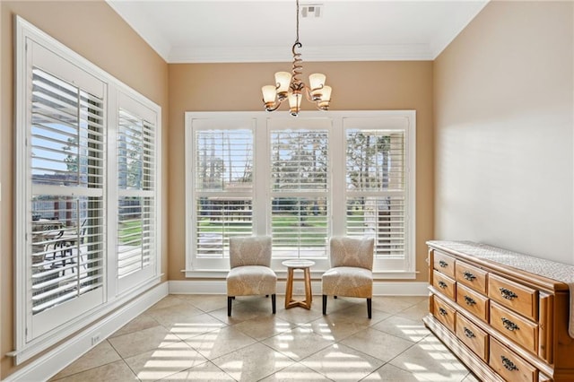 sitting room with crown molding, a chandelier, and light tile patterned floors