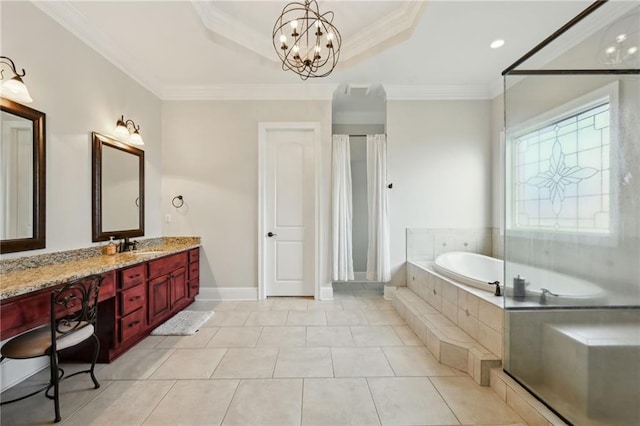 bathroom with a tray ceiling, crown molding, tile patterned flooring, and vanity