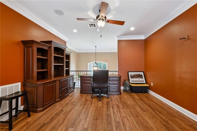 office area featuring crown molding, ceiling fan, and light hardwood / wood-style flooring