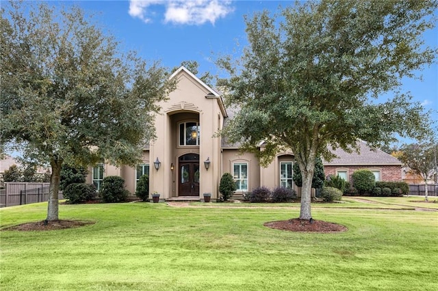 view of front of home with a front lawn