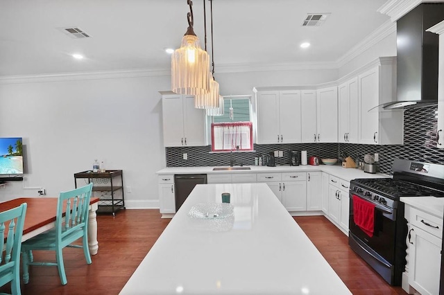 kitchen featuring dark wood-type flooring, white cabinetry, wall chimney exhaust hood, and black appliances