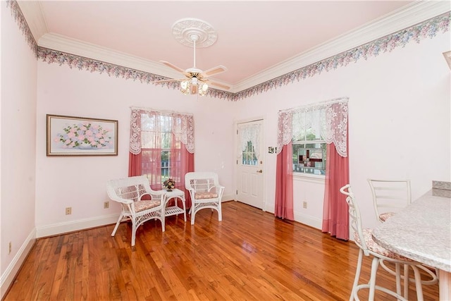 15070 Bruhl Rd, Folsom, LA 70437 - dining area featuring light wood-style flooring, a ceiling fan, and ornamental molding