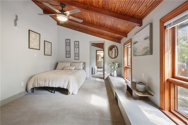 bedroom with wood ceiling, multiple windows, carpet floors, and lofted ceiling with beams