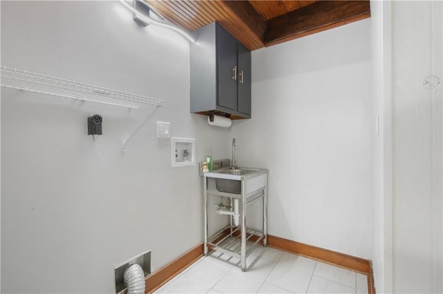 washroom featuring sink, cabinets, washer hookup, light tile patterned floors, and wood ceiling