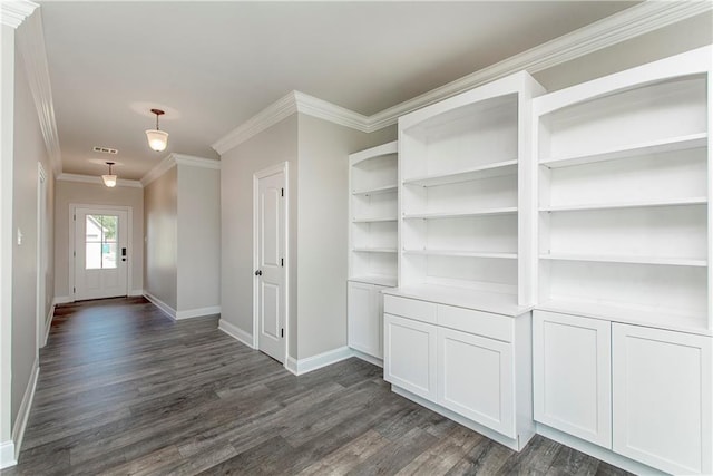 entryway featuring ornamental molding and dark wood-type flooring