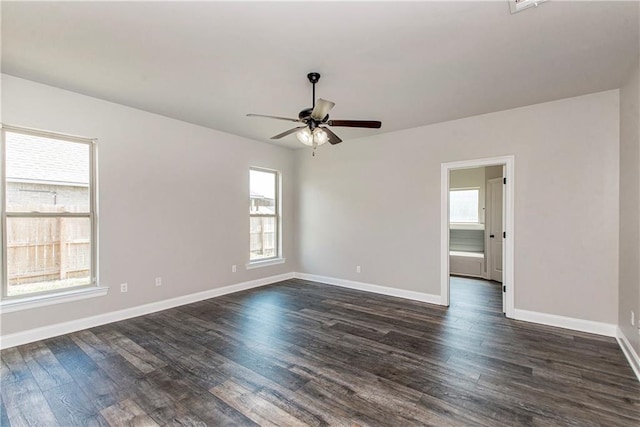 unfurnished room featuring dark hardwood / wood-style flooring and ceiling fan