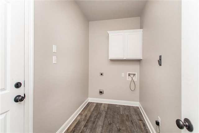 laundry room with hookup for an electric dryer, washer hookup, dark hardwood / wood-style floors, and cabinets